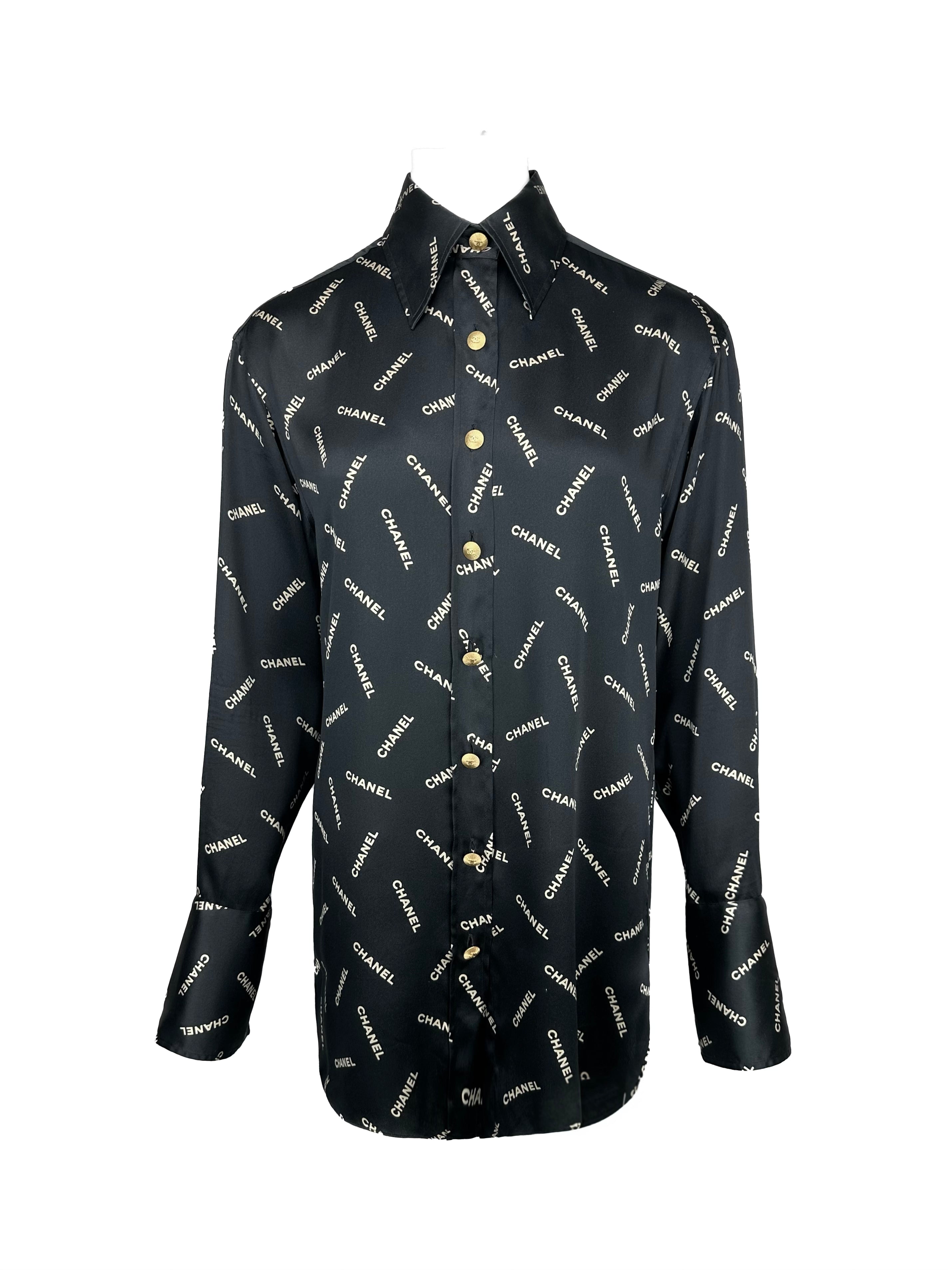 CHANEL FALL / WINTER 1992 BLACK WHITE SILK ALL OVER SPELLOUT LOGO SILK BUTTON UP CUFFLINK BLOUSE