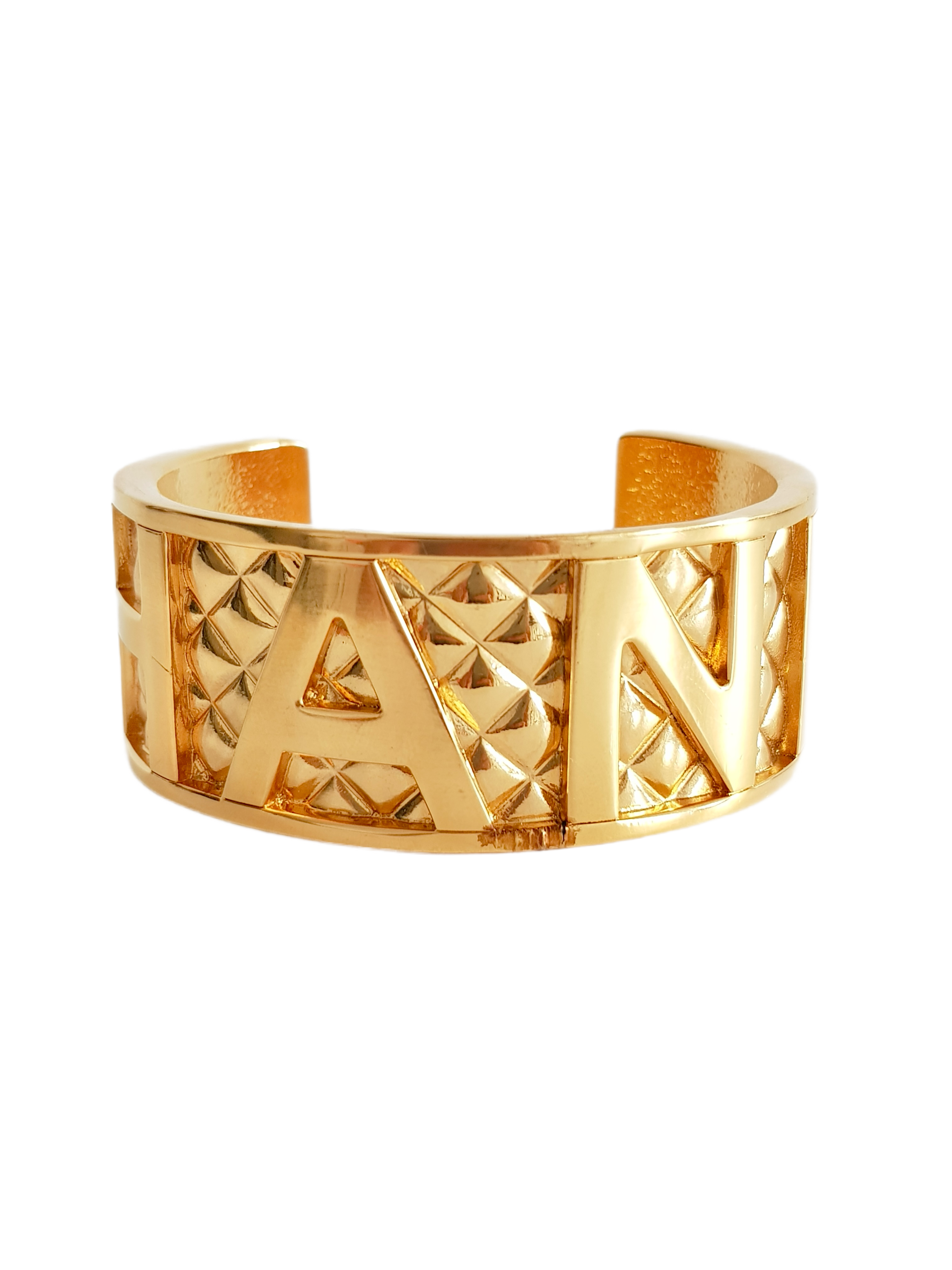 CHANEL SPRING / SUMMER 1997 (97P)  GOLD PLATED QUILTED SPELLOUT LOGO CUFF BRACELET