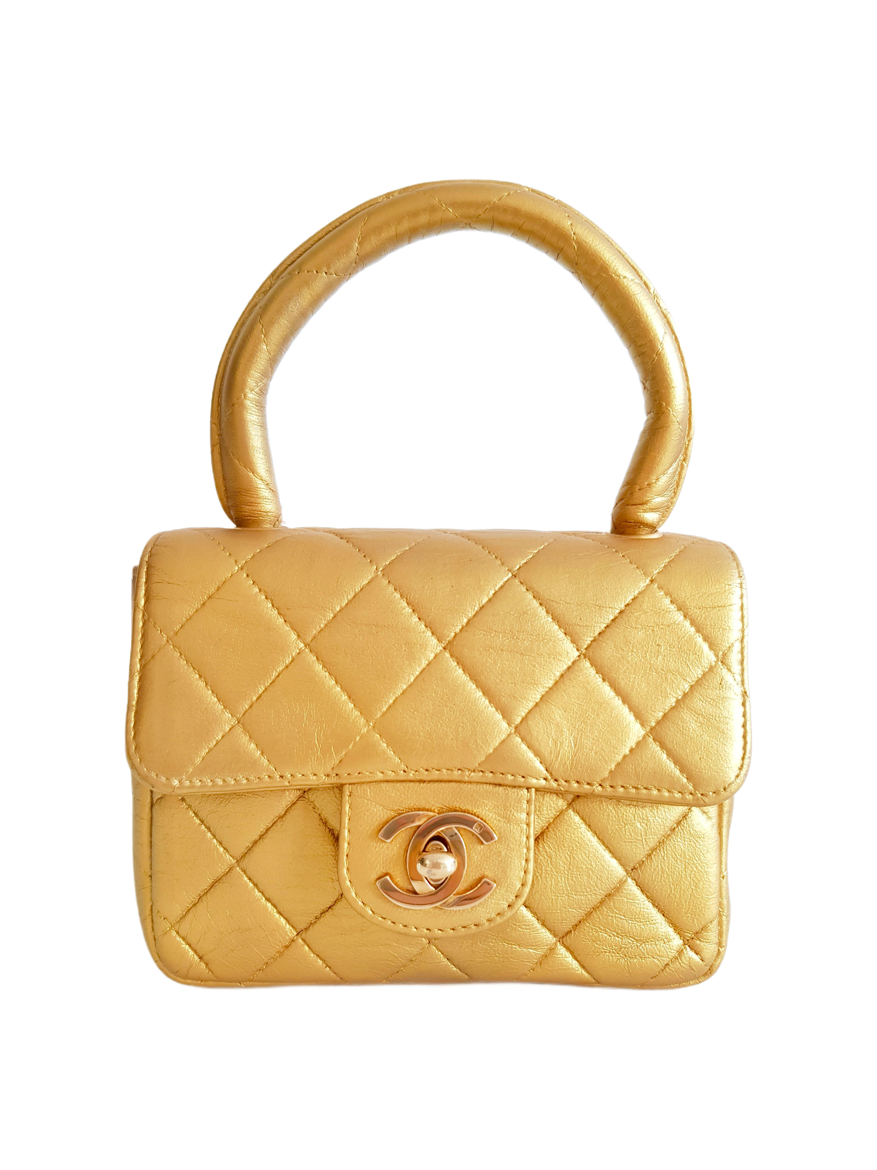 CHANEL FALL / WINTER 1994 (28 SERIES) GOLD QUILTED LEATHER CC TURNLOCK LOGO TOP HANDLE MICRO HAND BAG