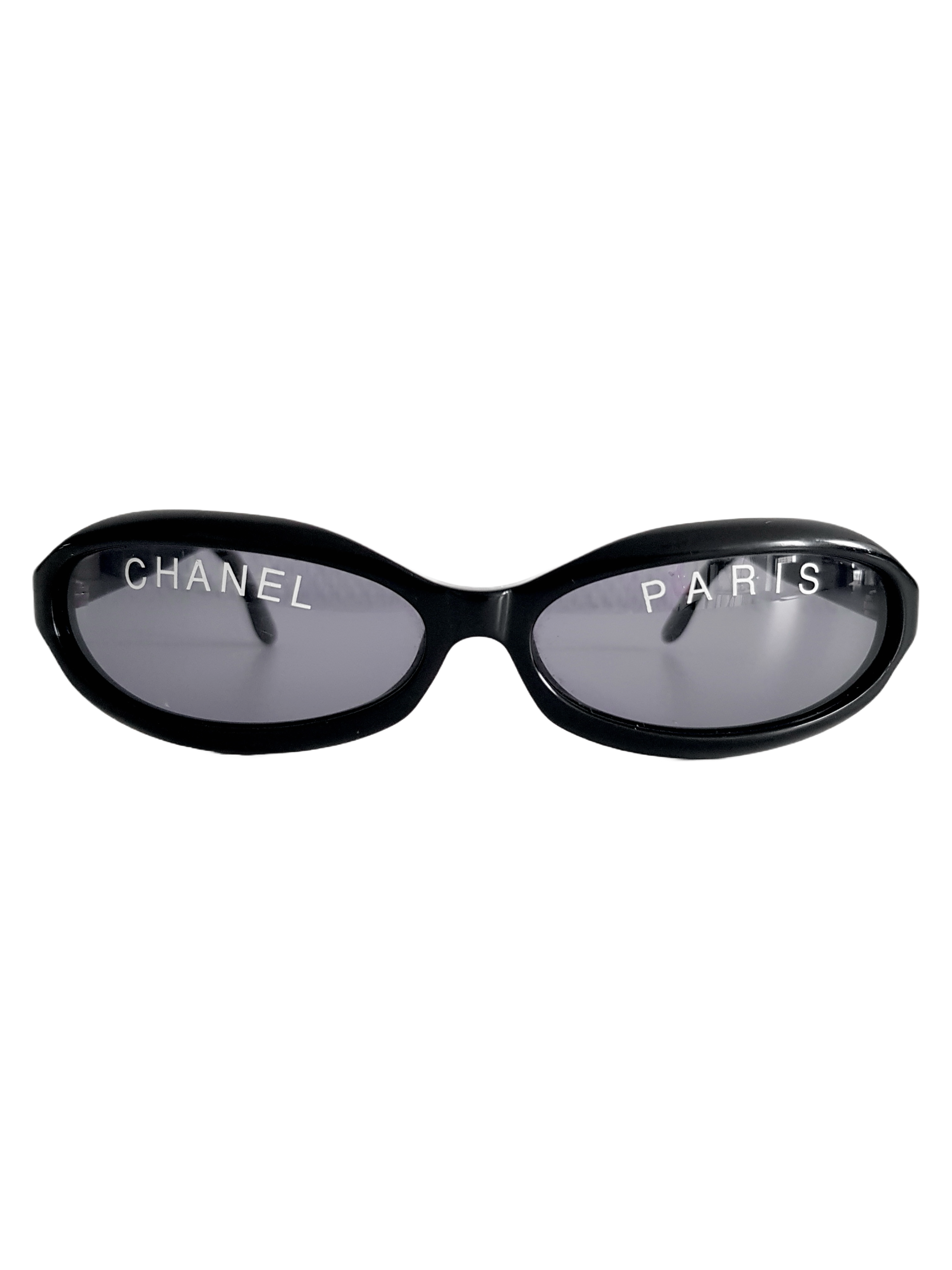 CHANEL FALL / WINTER 1994 BLACK LUCITE WHITE 'CHANEL PARIS' SPELLOUT LOGO SUNGLASSES