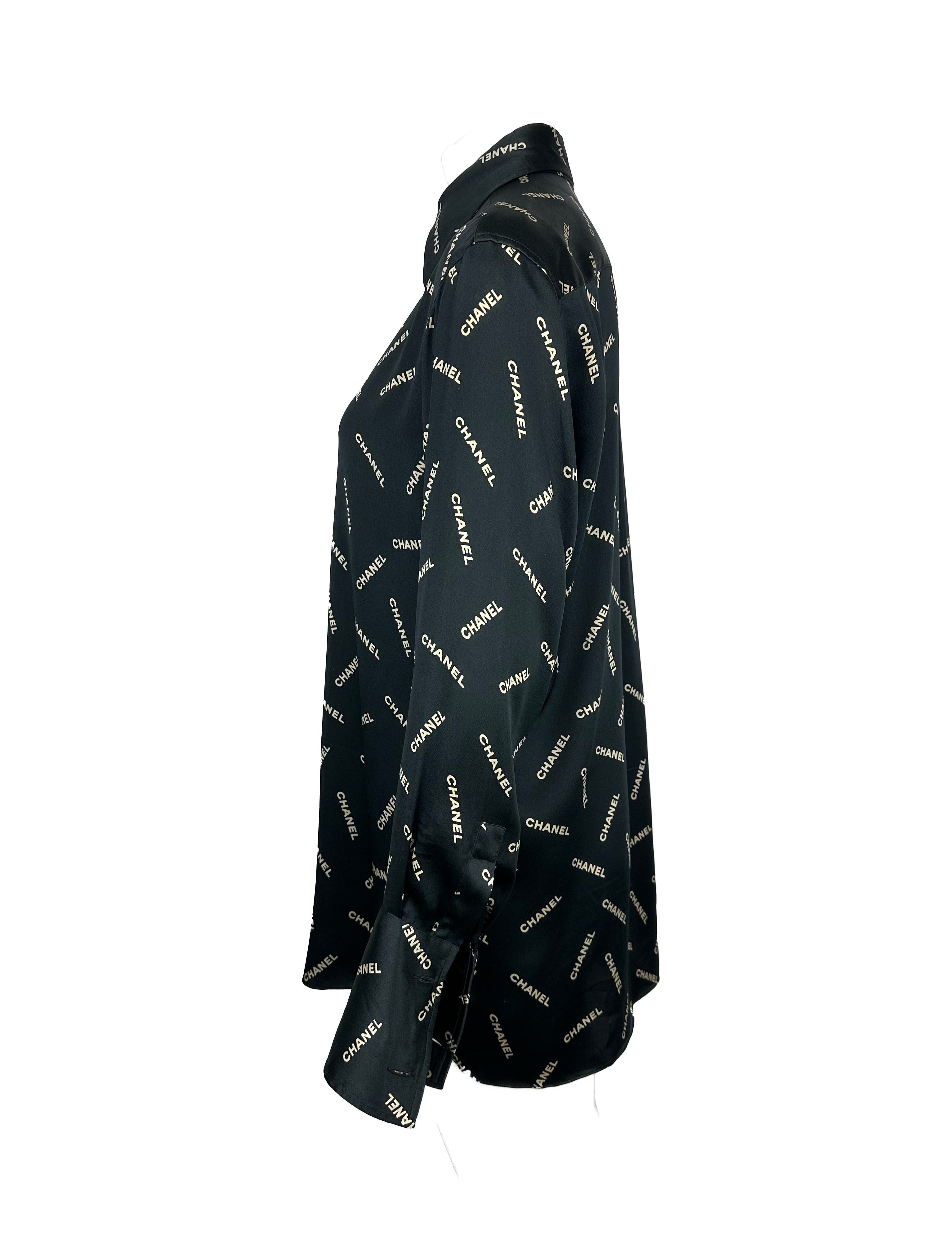 CHANEL FALL / WINTER 1992 BLACK WHITE SILK ALL OVER SPELLOUT LOGO SILK BUTTON UP CUFFLINK BLOUSE